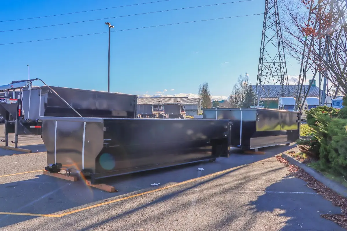 Roll-off dumpster ready for waste disposal at job site for 4 Yard Dumpster Rental in Troy